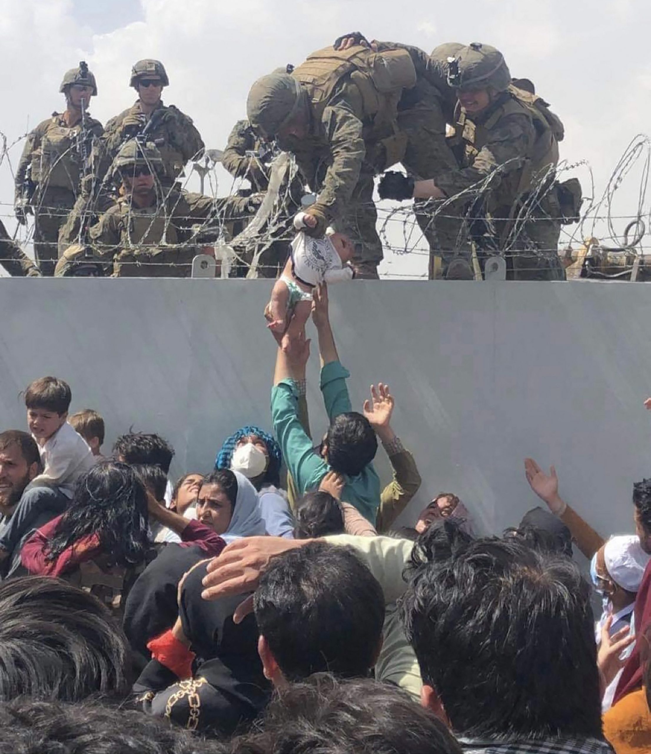 Marine Corps Spox Reacts to Marine’s Claim He Lifted Baby Over Wall at Kabul Airport