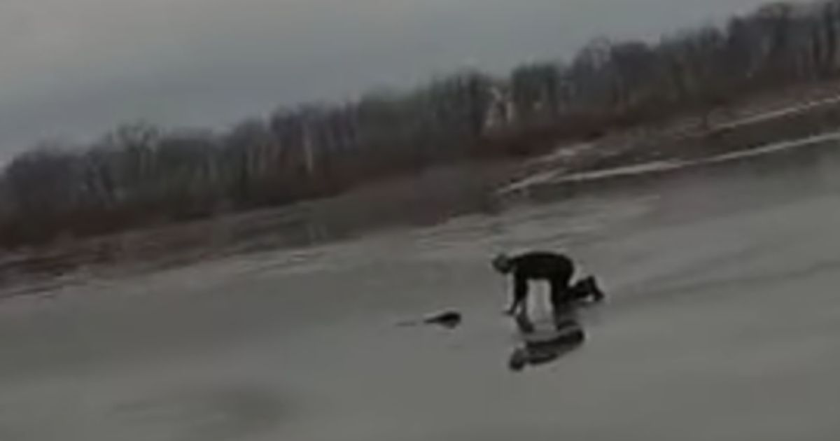 Police Officer Scrambles To Save Dog After Tragic Fall Through Thin Ice