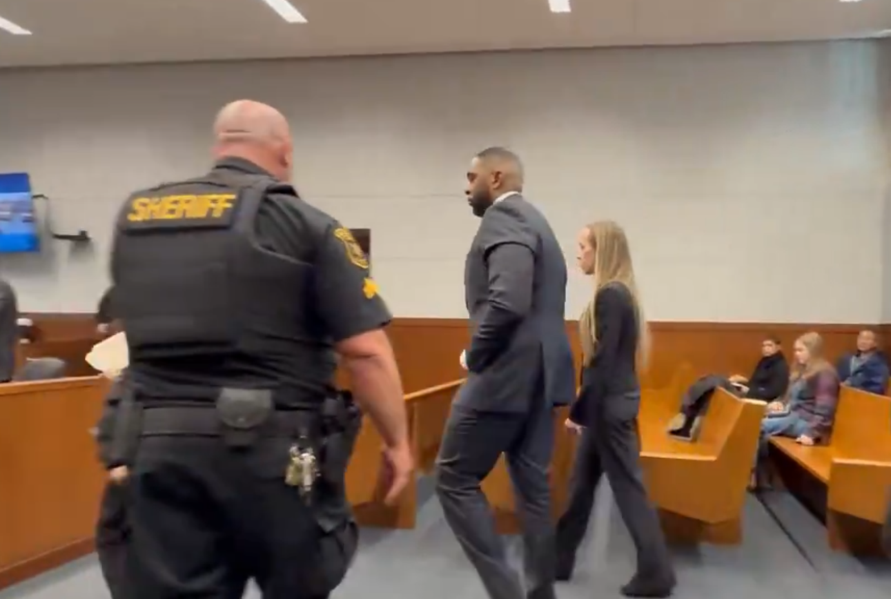 Ex-Michigan Coach Sherrone Moore Smiles in Court as Wife Looks On Amid Felony Case