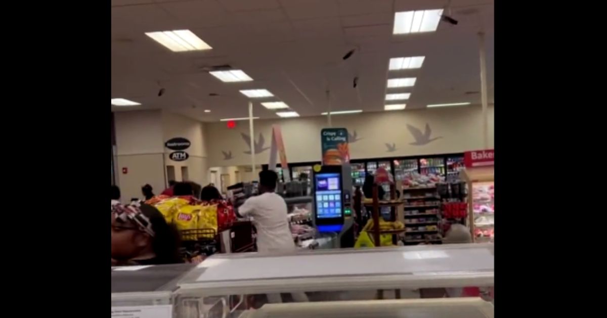 Woman and Child Realize Large Group Is About to Trash Store, Immediately Cut a Line for the Exit