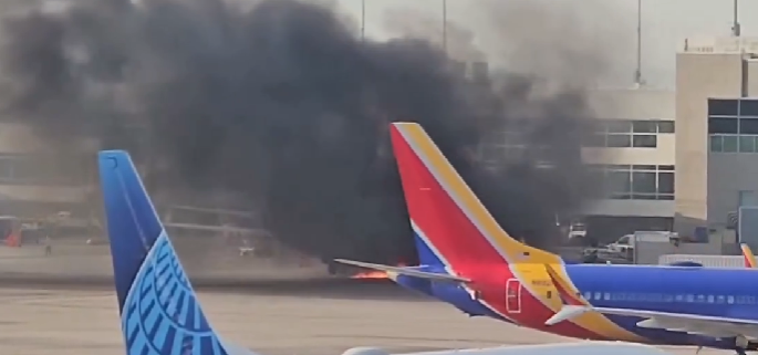 Breaking: American Airlines Plane on Fire At Denver Airport
