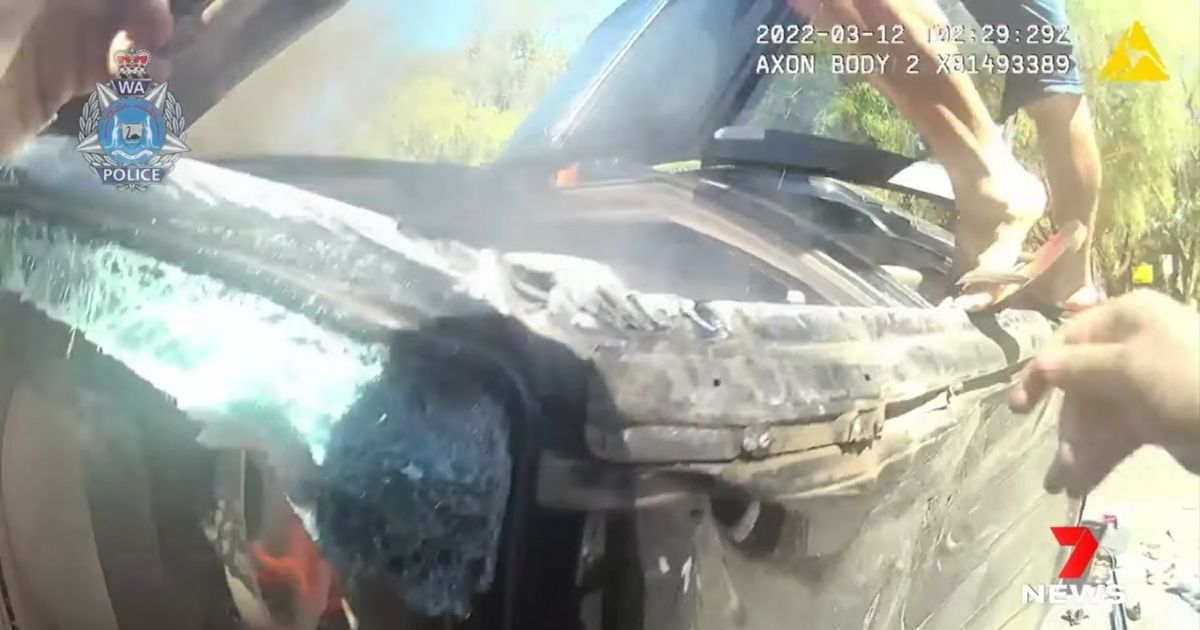 Man in Flip-Flops Jumps Onto Burning Car Wreck to Help Free Trapped Elderly Couple