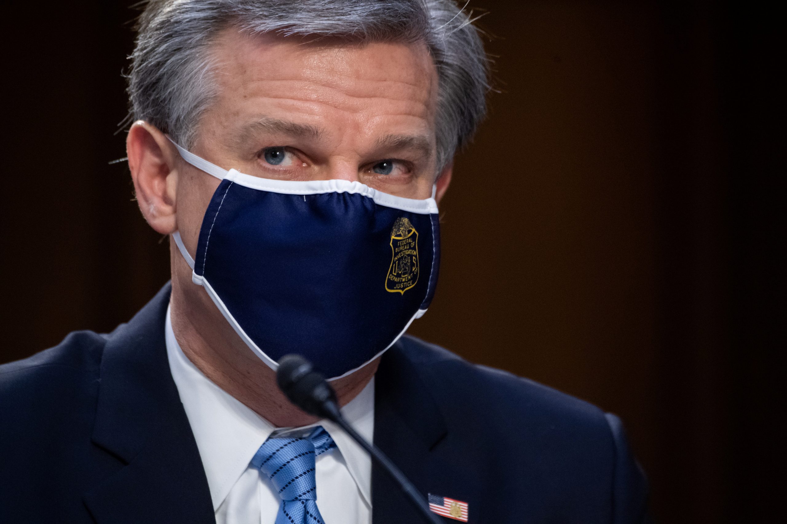 Wray Says 5 QAnon Conspiracy Advocates Arrested for Jan. 6 Capitol Attack