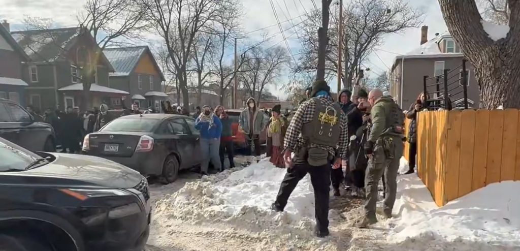 Crowd Surrounds ICE Agents During Enforcement Operation In Minneapolis