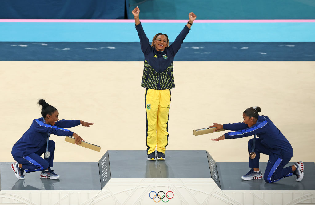 Biles, Chiles Bow to Gold Medalist Rebeca Andrade on Award Podium