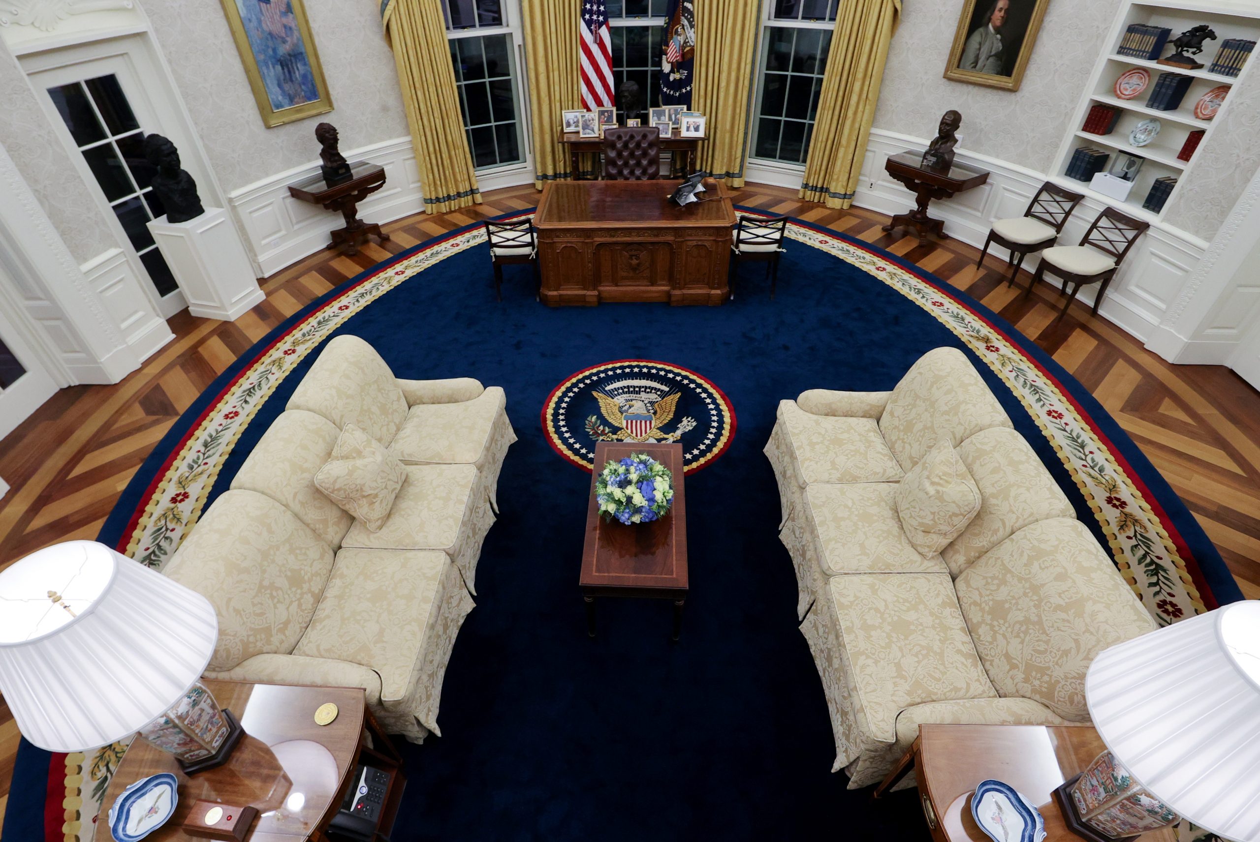 Biden’s Oval Office Swaps Andrew Jackson, Military Flags for Family Photos, Civil Rights Leaders