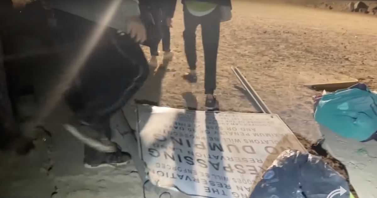 Illegal Immigrants Literally Walking on 'No Trespassing' Signs to Get Into America