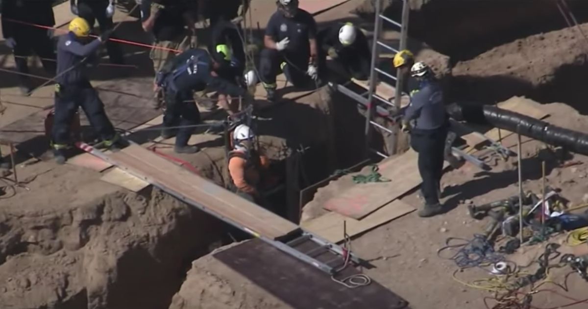 Rescue Caught on Video: Construction Worker Falls Into Trench on the Job, Coworker Jumps In After Him