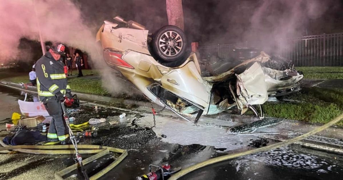Woman Pinned in Flipped, Burning Car Faces Certain Death Until Firefighter Gives Her His Oxygen Mask