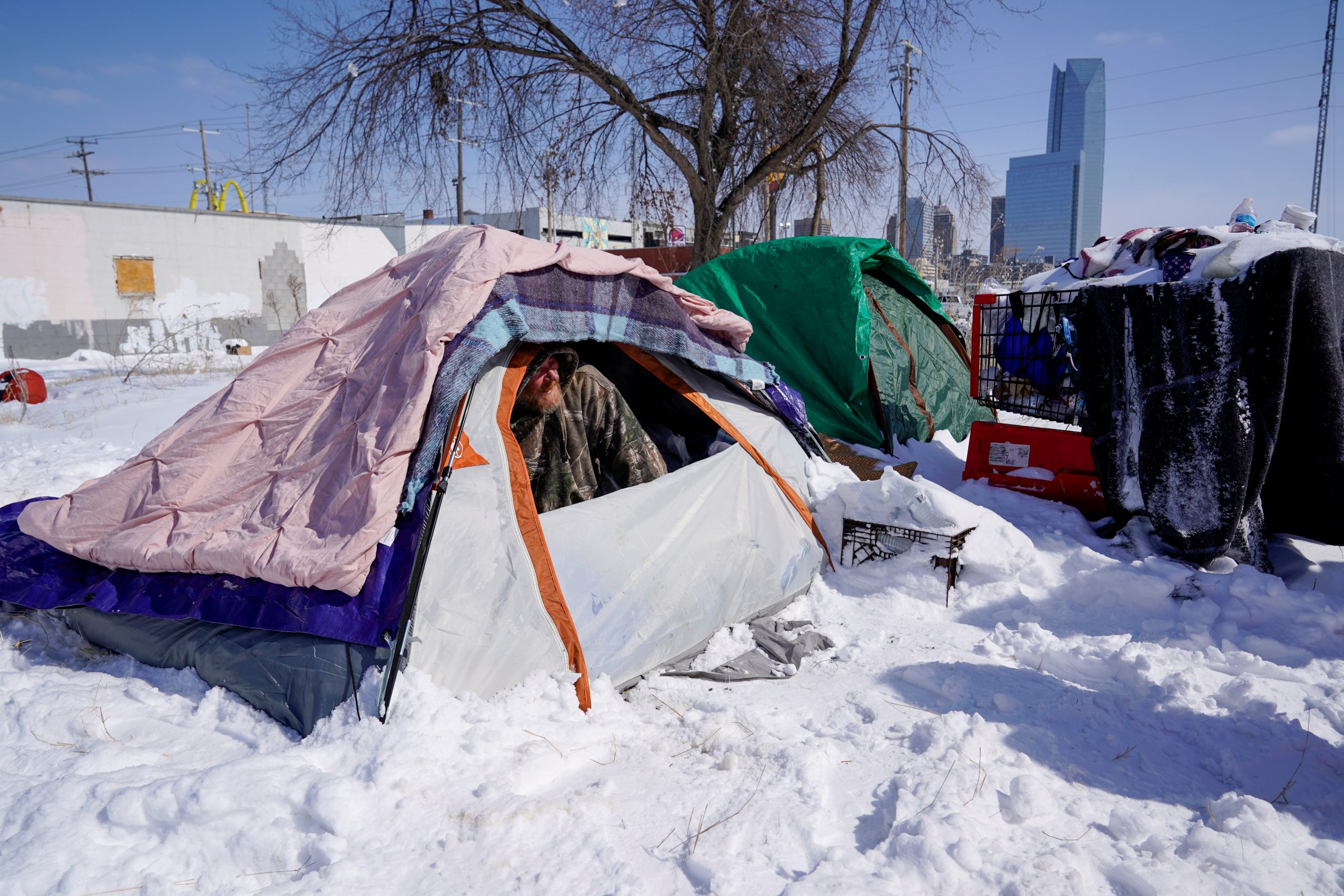 Texas Deep Freeze Leaves Millions Without Power, Some Snowboarding Behind Pickups