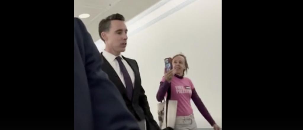 EXCLUSIVE: Josh Hawley Gives Code Pink Activist A Taste Of Her Own Medicine