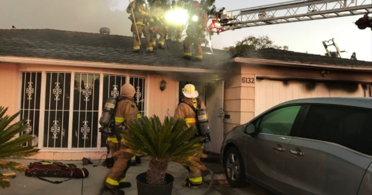 Family Trapped in Burning House Saved After Family Member Grabs Firefighter Through Barred Window