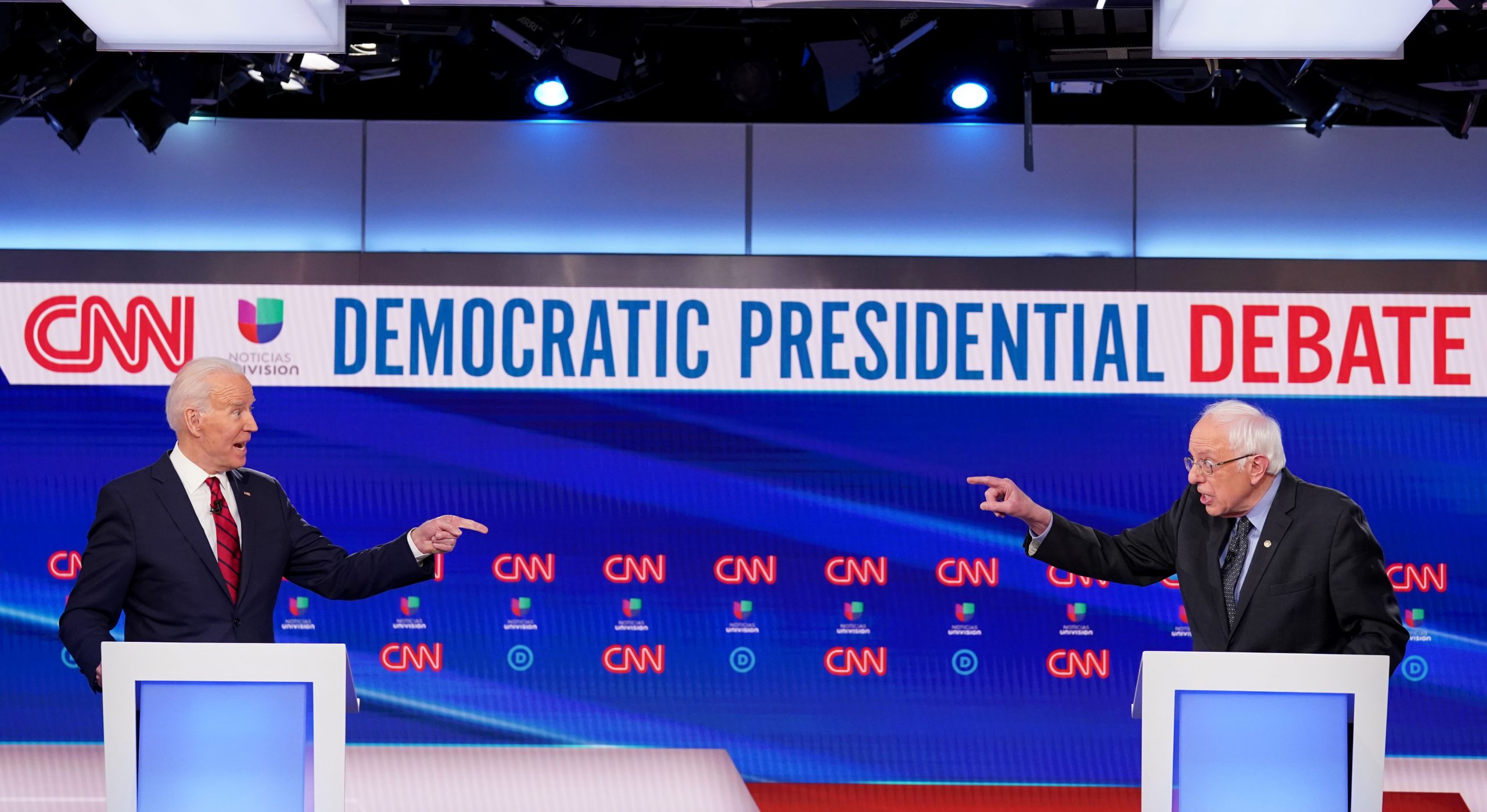 Results or Revolution? Biden, Sanders Present Dueling Visions While Blasting Trump’s Coronavirus Response