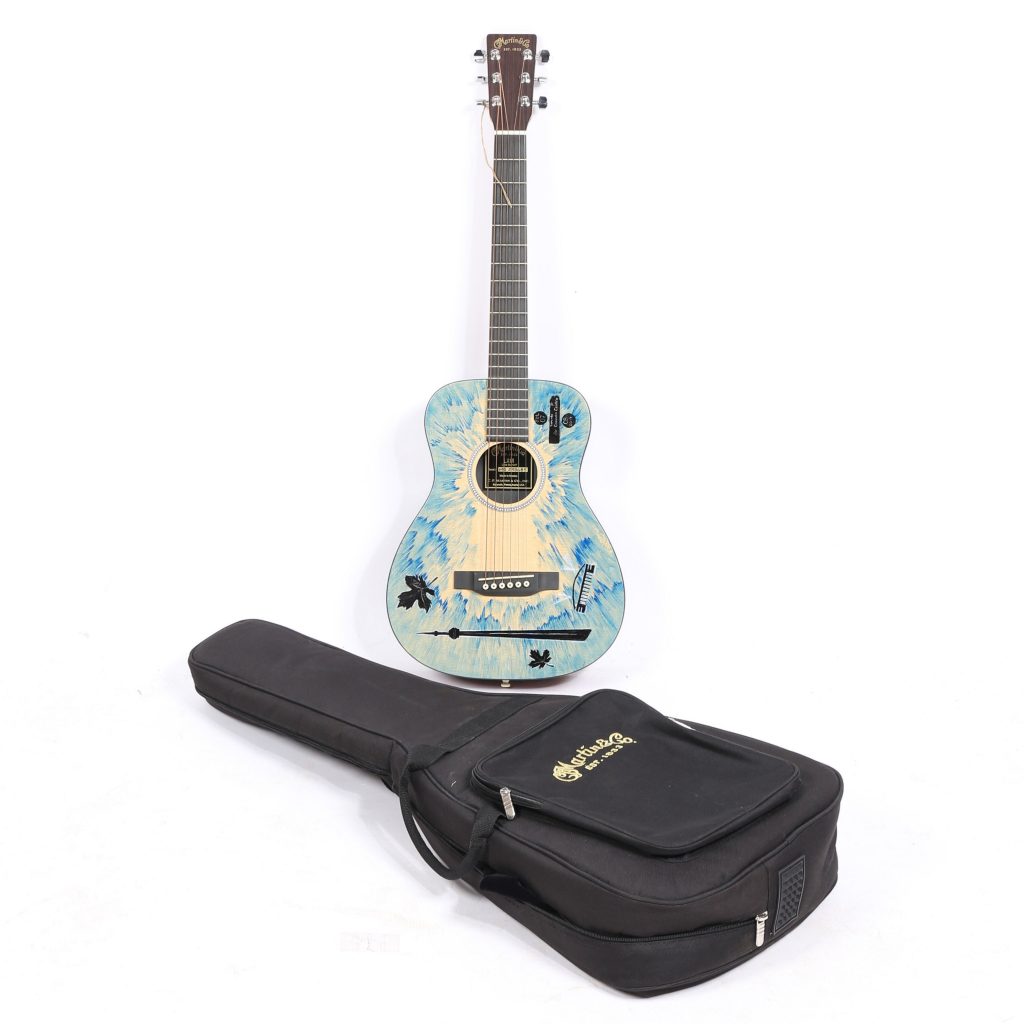Ed Sheeran Charity Auction: Guitar Donation Expected To Surpass Estimates‌
‌