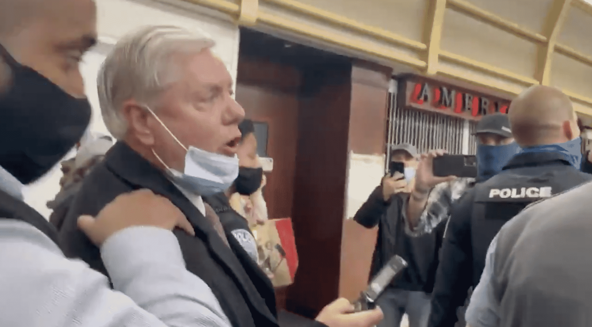Lindsey Graham Harassed by Angry Trump Supporters Shouting ‘Traitor’ at Airport