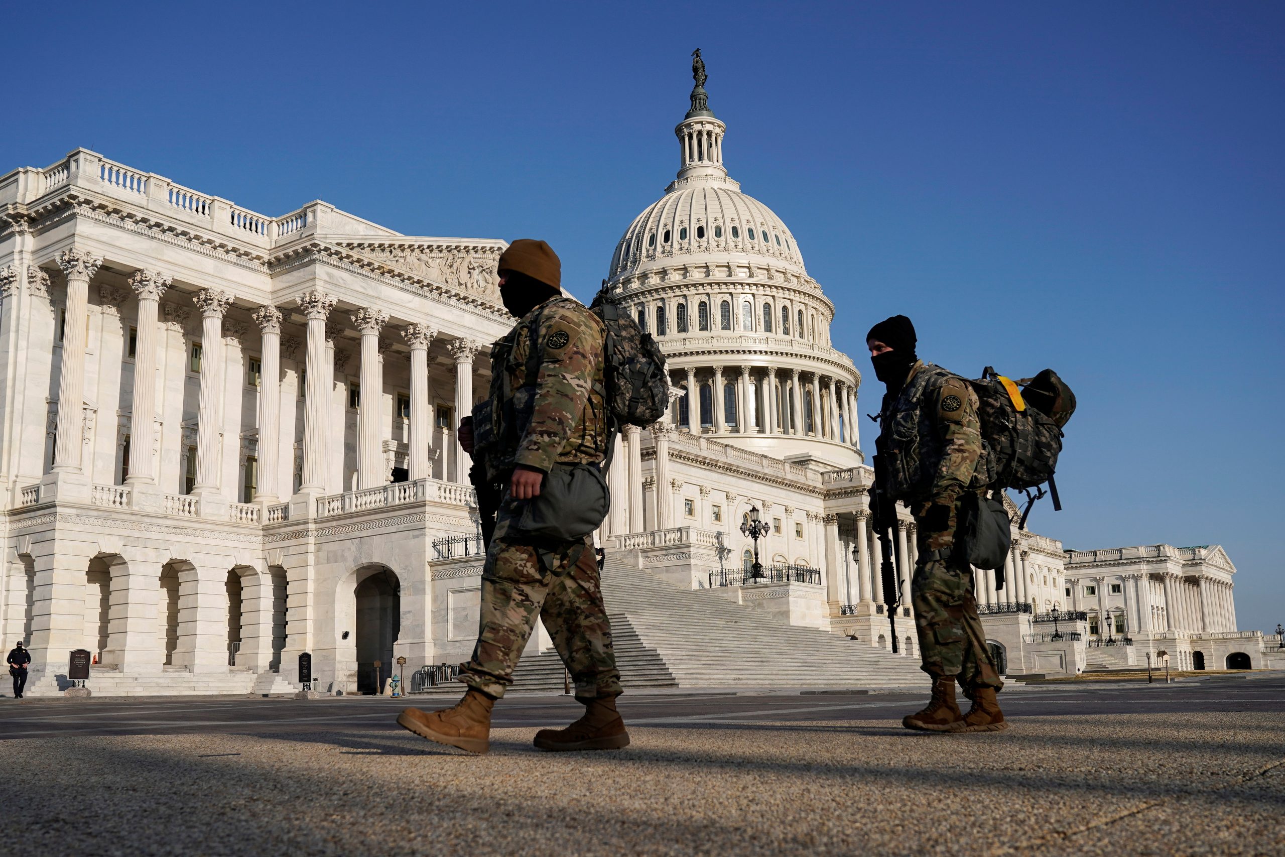US Capitol Calm Amid High Security; Trump Supporters Hold Faith He Will Return