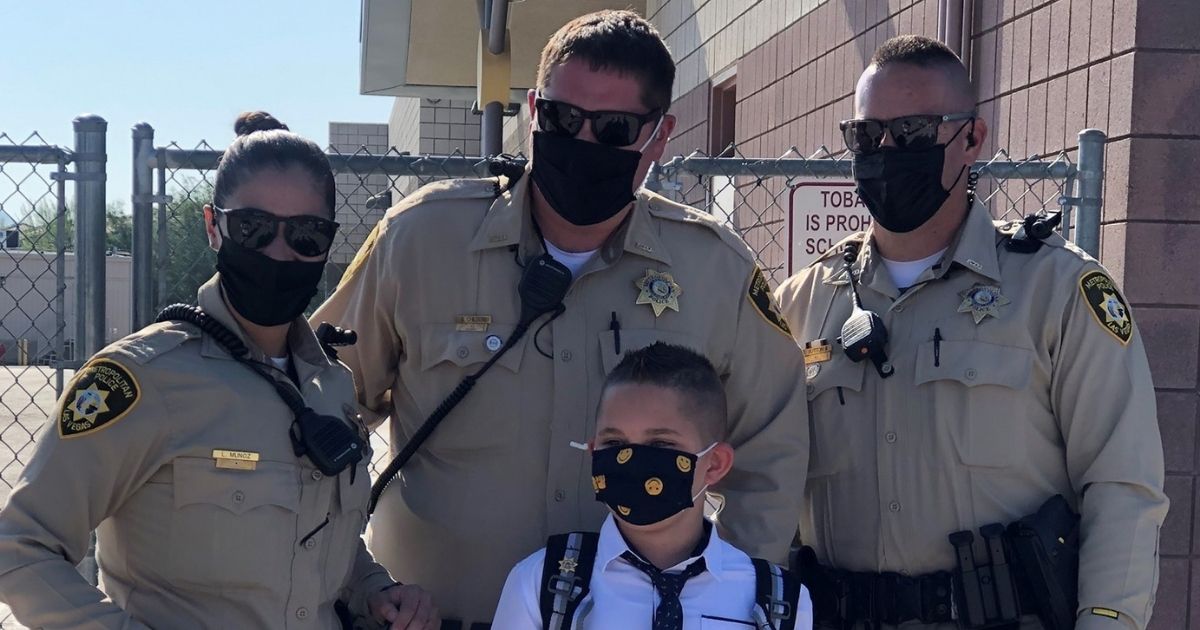Police Escort Son of Fallen Officer to First Day of Fourth Grade: 'We Will Always Be Here for You'