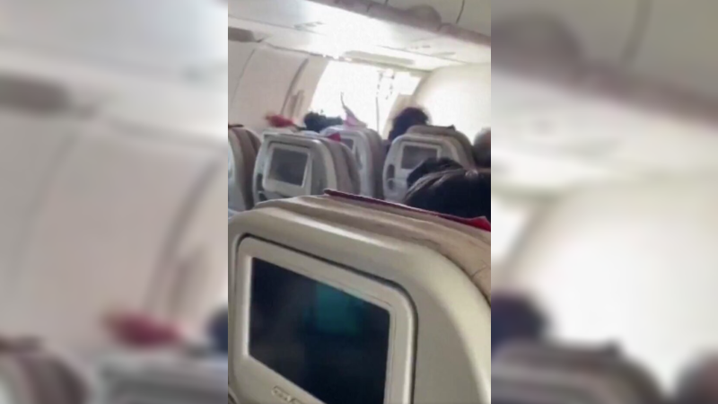 Video Captures Terrifying Moment After Passenger Opens Emergency Door Midflight