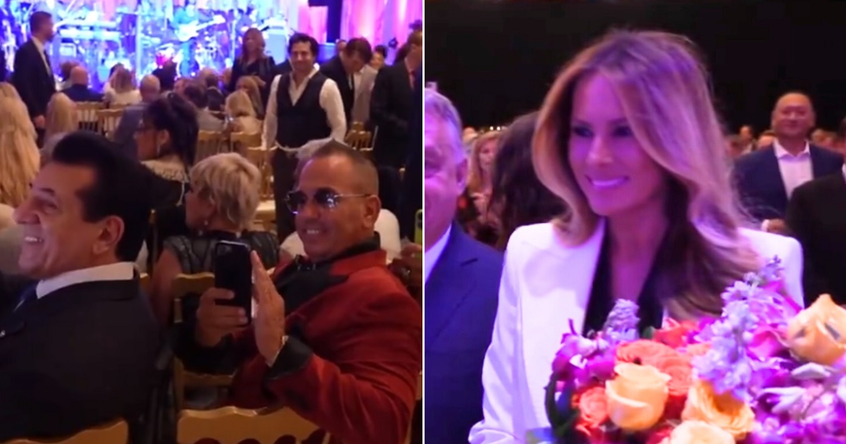 Watch: Melania Drops Jaws in Gorgeous White Pantsuit, Serenaded with ‘Pretty Woman’ as She Walks into Room