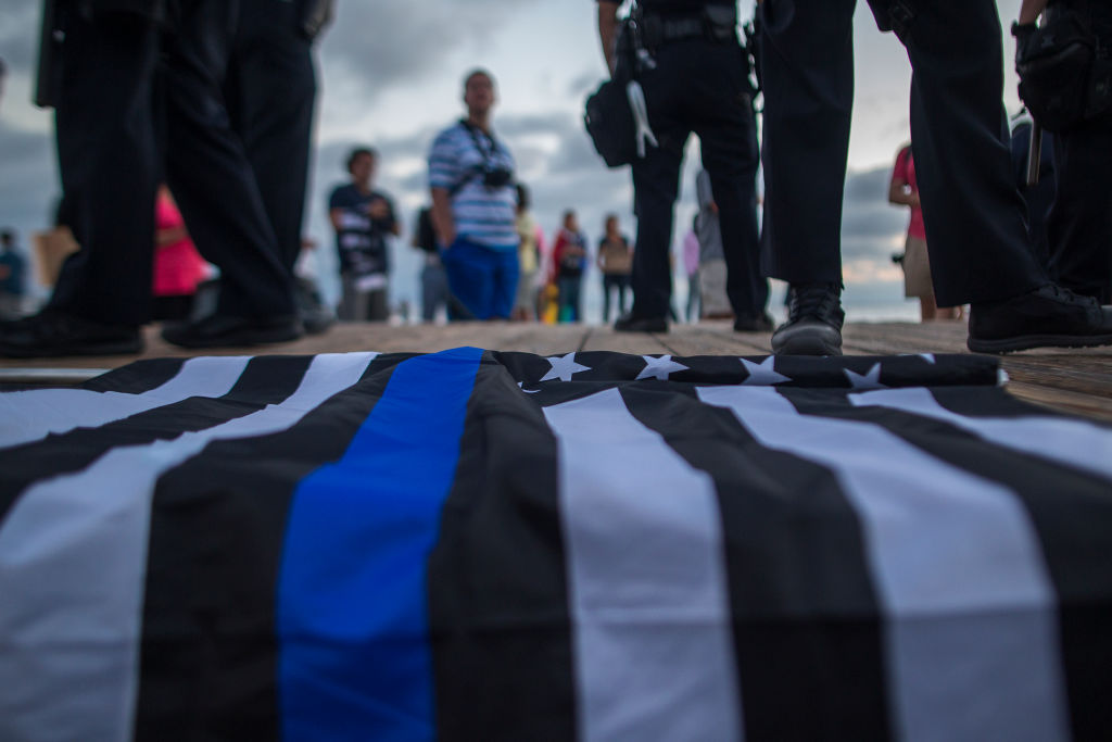 School Caves After People Feel 'Uncomfortable and Unwelcome,' Will No Longer Allow Flag to Be Carried Onto Field