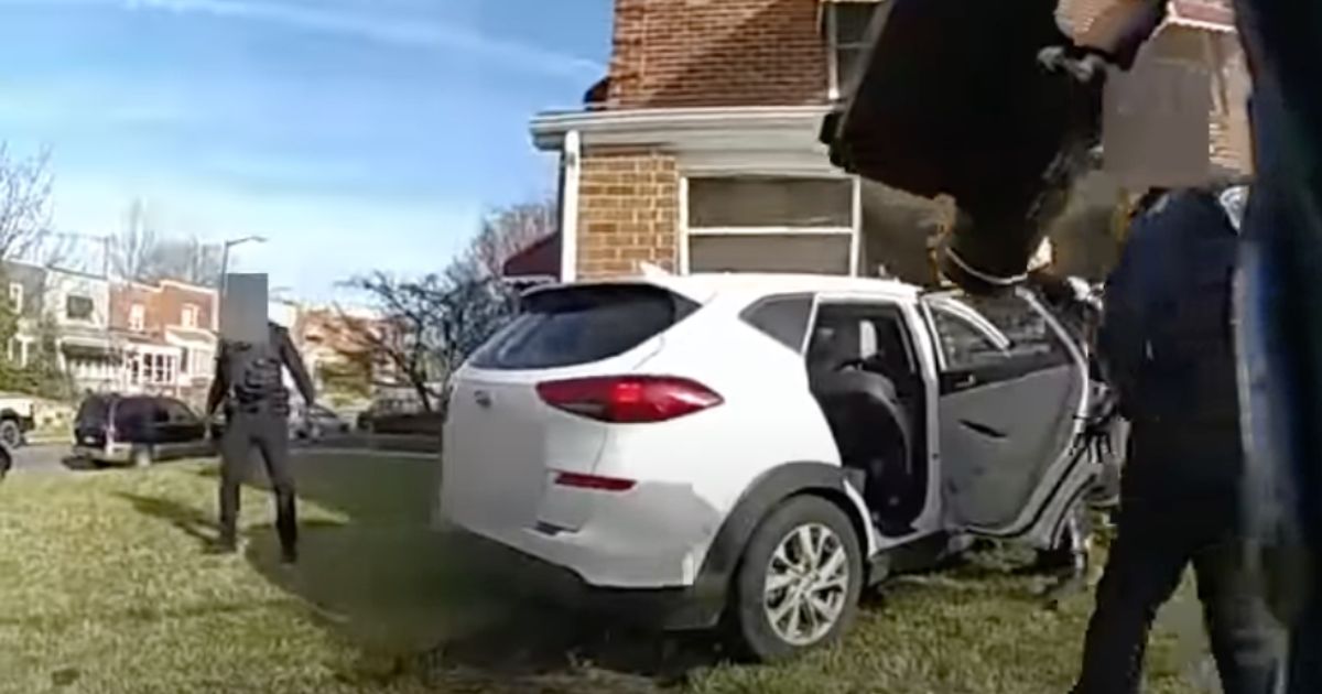 Police Bodycam Video Captures Chaotic Scene Where Teen Attempts to Drive Away with Officer in Vehicle