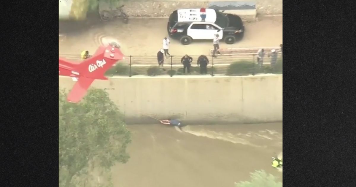 Video: Fire Department Rescues Dog from Swift River after Multiple Failed Rescue Attempts
