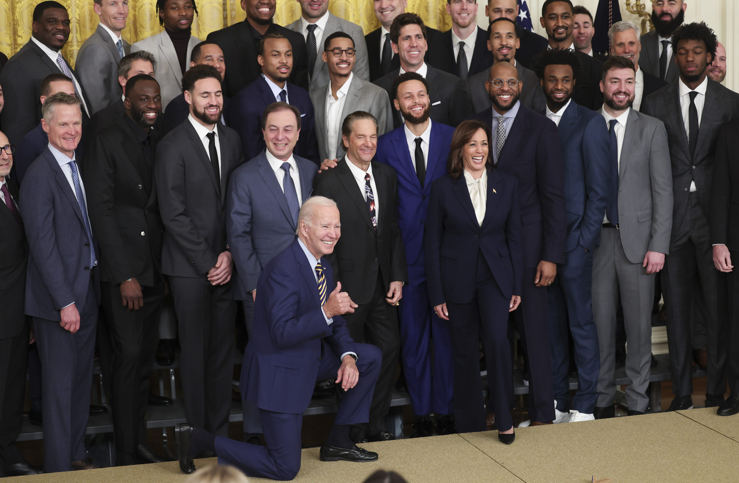 Biden’s Pose During Photo With NBA Team Sparks Awkward Reaction From Harris
