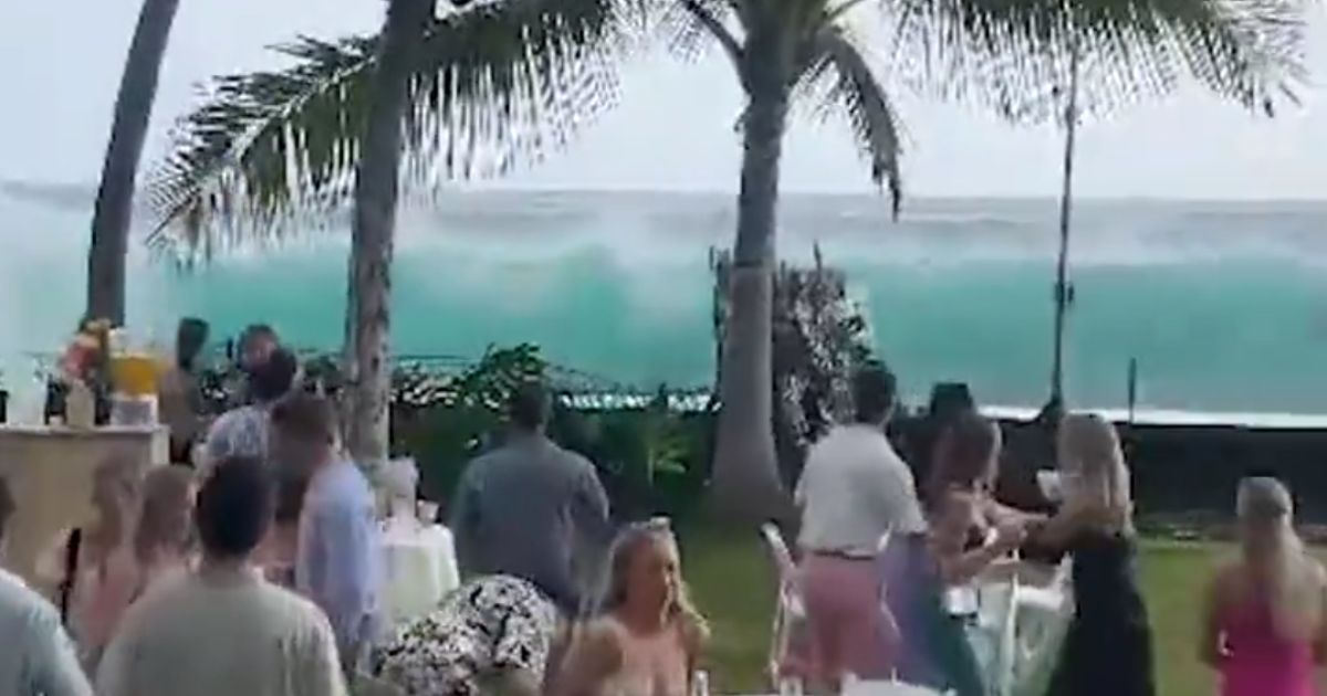 Watch: Guests Can Only Stare at Massive Wave Before Realizing It's Too Late to Run
