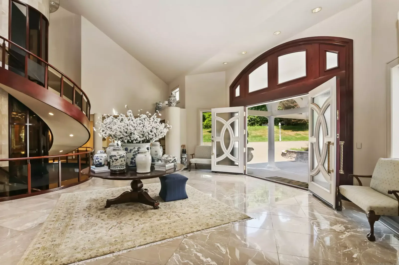 The foyer looking out through the front doors.