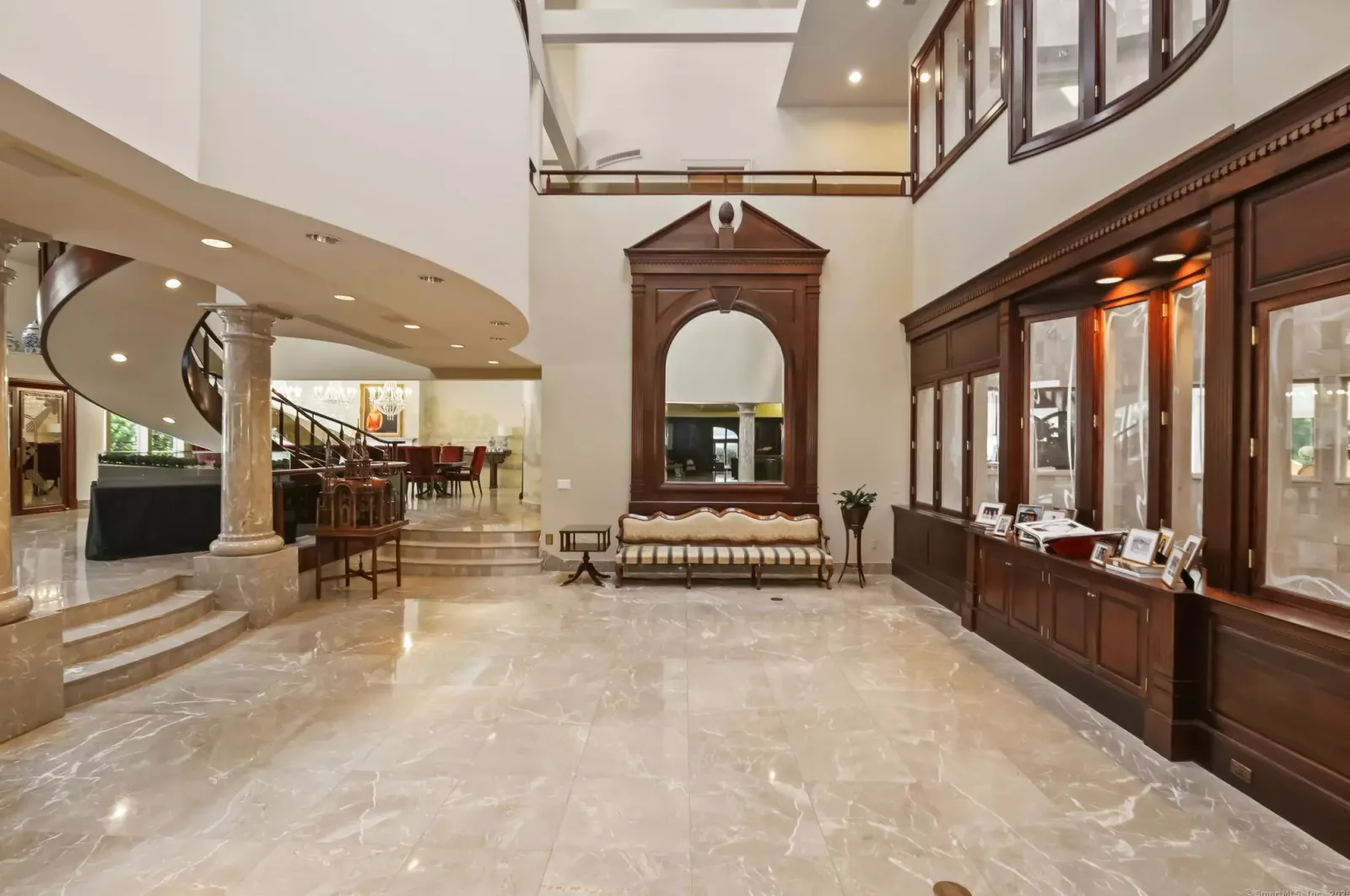 A hall of built-in display cabinetry on the main floor.