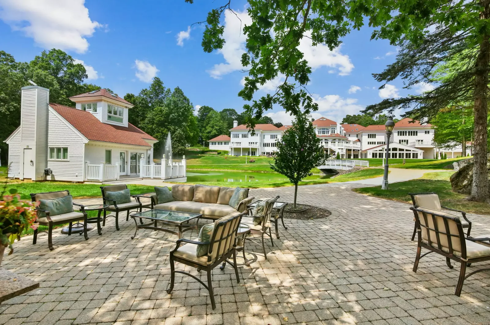 The stone patio, with the guesthouses beyond.
