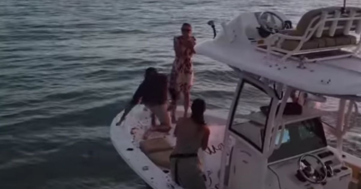 Watch: Man’s Proposal Gets Off to Wet Start, Dives Headlong Into Bay After Ring Bounces Off Boat Straight Into the Water