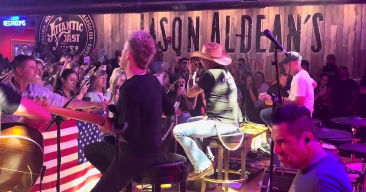 Defiant Jason Aldean Surprises with New Rendition of Hit Anti-Woke Song at His Restaurant Grand Opening
