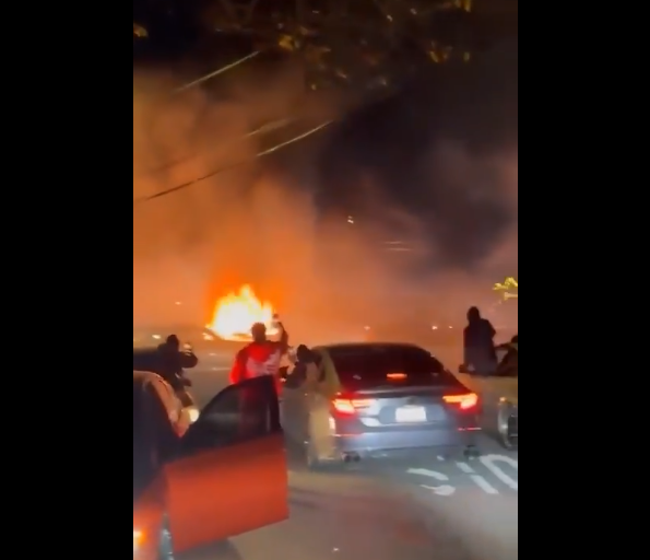 Watch: Queens Street Takeover Turns Violent, Couple Beaten and Car Set Ablaze