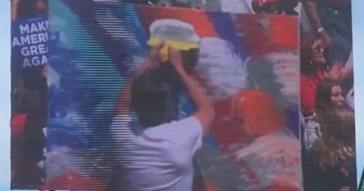 Artist Furiously Painting US Flag at Trump Rally Begins Peeling Middle of Work, Crowd Goes Wild When They Realize What’s Happening