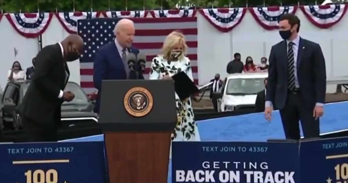 Biden Needs 30 Seconds and Two Helpers To Locate His Mask After Georgia Speech