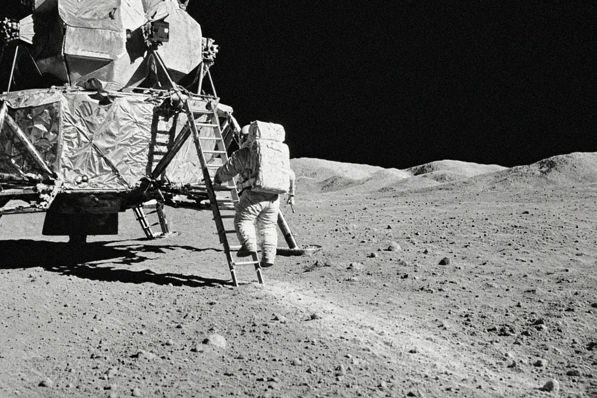 Neil Armstrong descended the ladder of the Eagle lunar module, captured in ghostly black-and-white television footage.