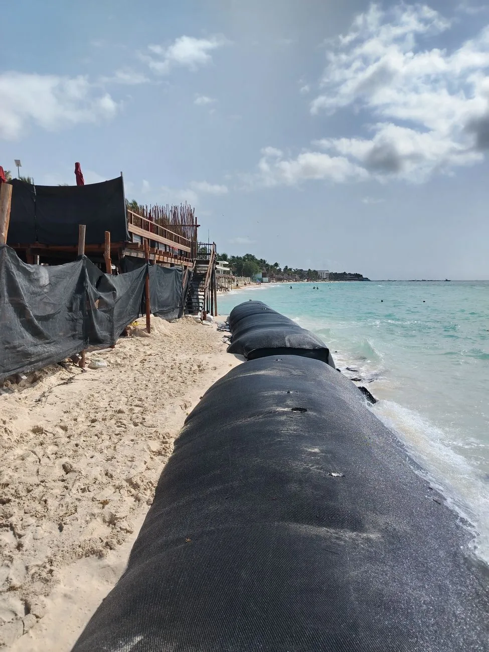 Crews fortify beaches amid widespread king-tide erosion