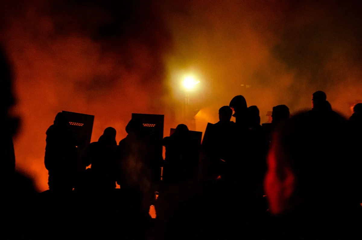 Arrests in Barcelona after 'anti-system' rioters loot shops, set fires