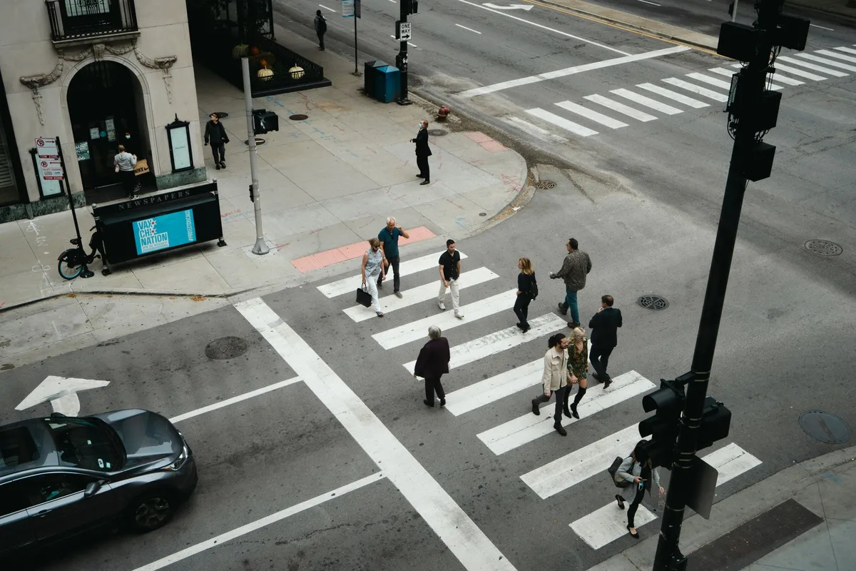 Woman dies after turning vehicle hits her at Rochester intersection