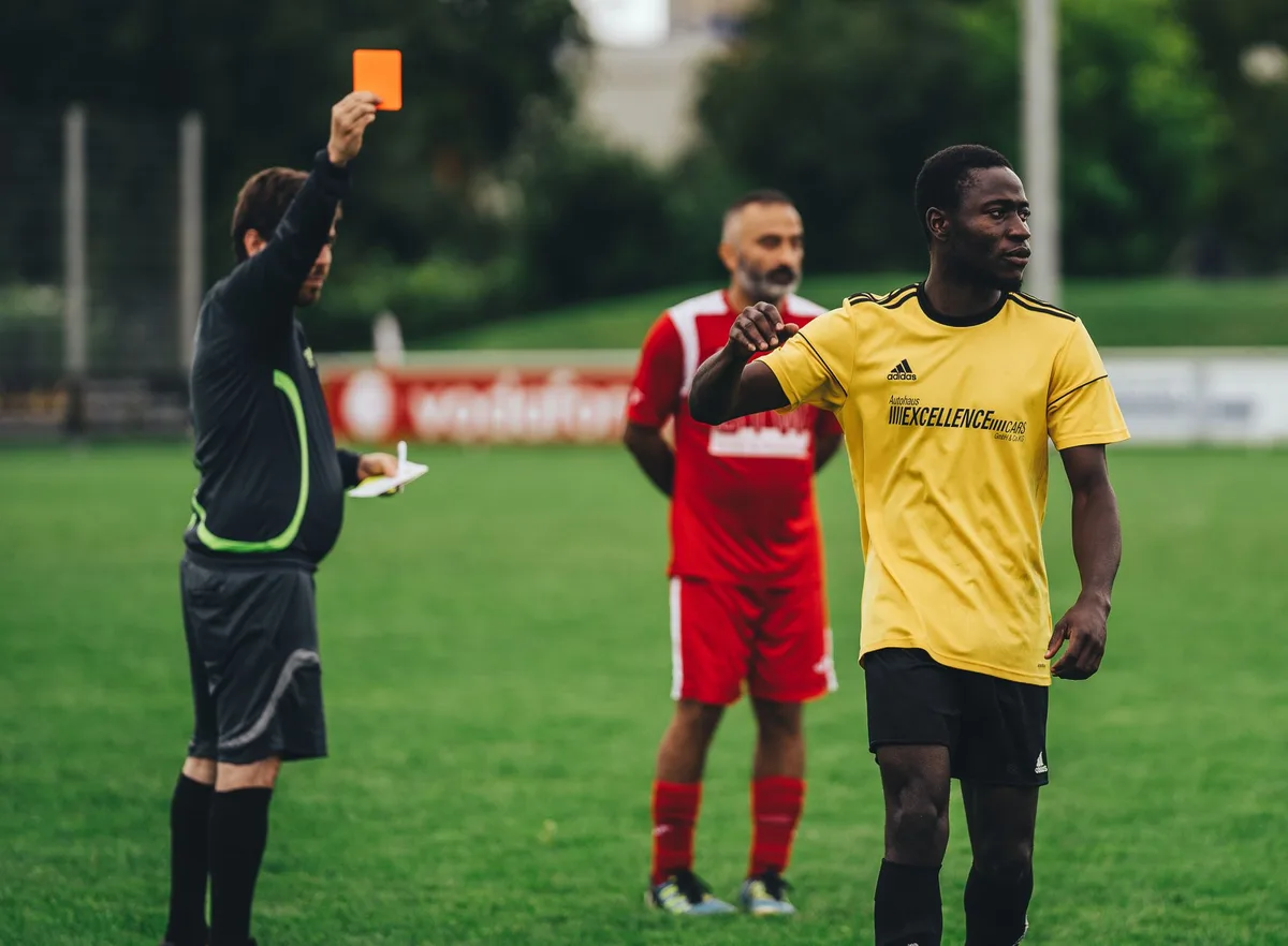 Abu Farchi Sent Off for Gun Gesture