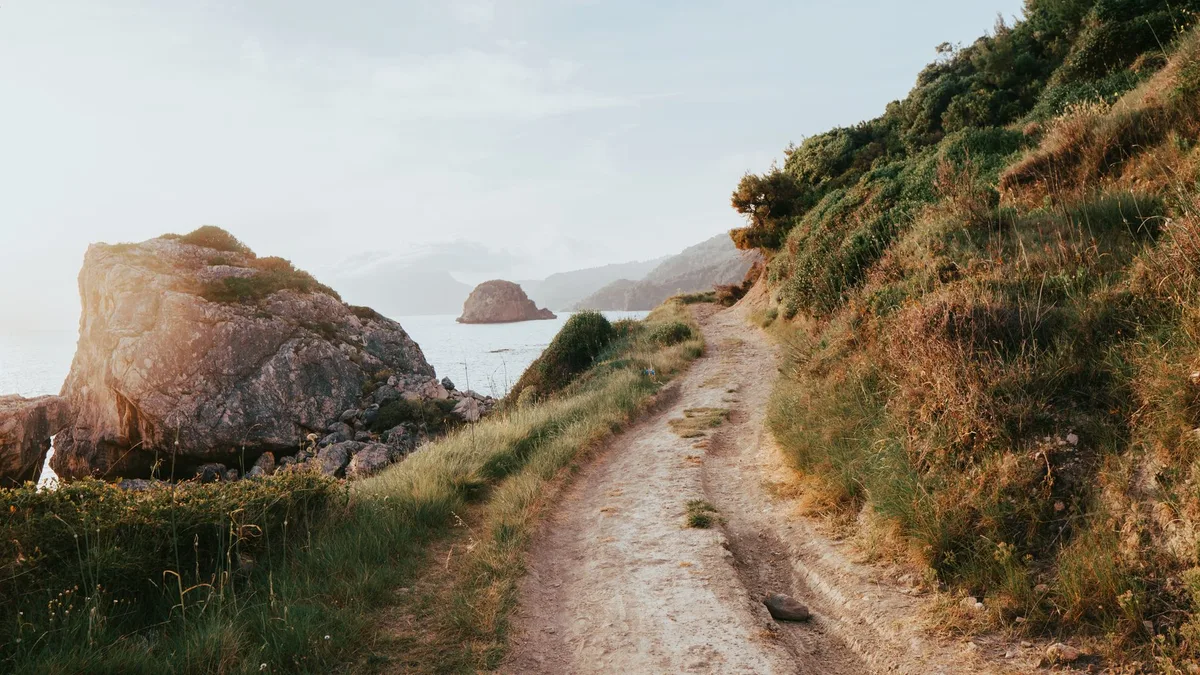 Photographer Survives 200-Foot Fall in Portugal