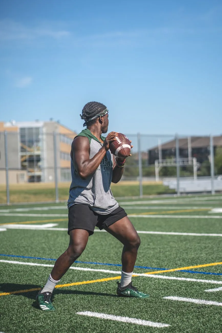How to throw a football spiral