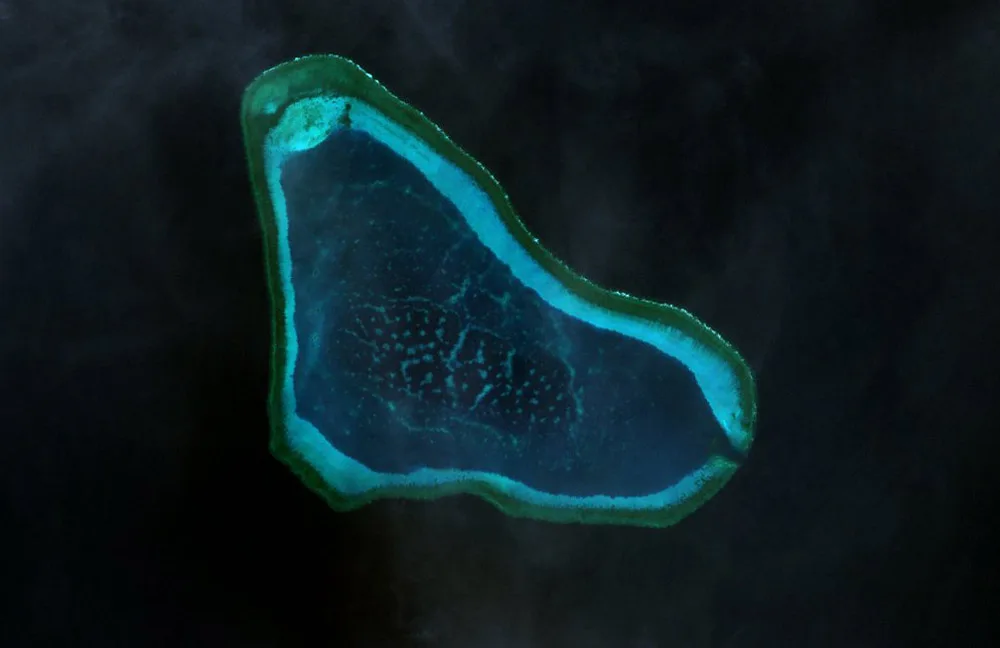 China Strengthens Patrols at Disputed Scarborough Shoal After Philippines Clashes