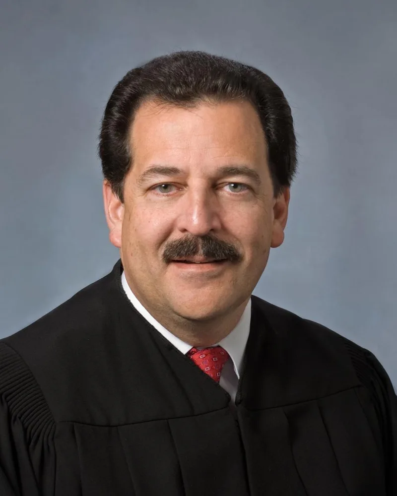 John A. Mendez